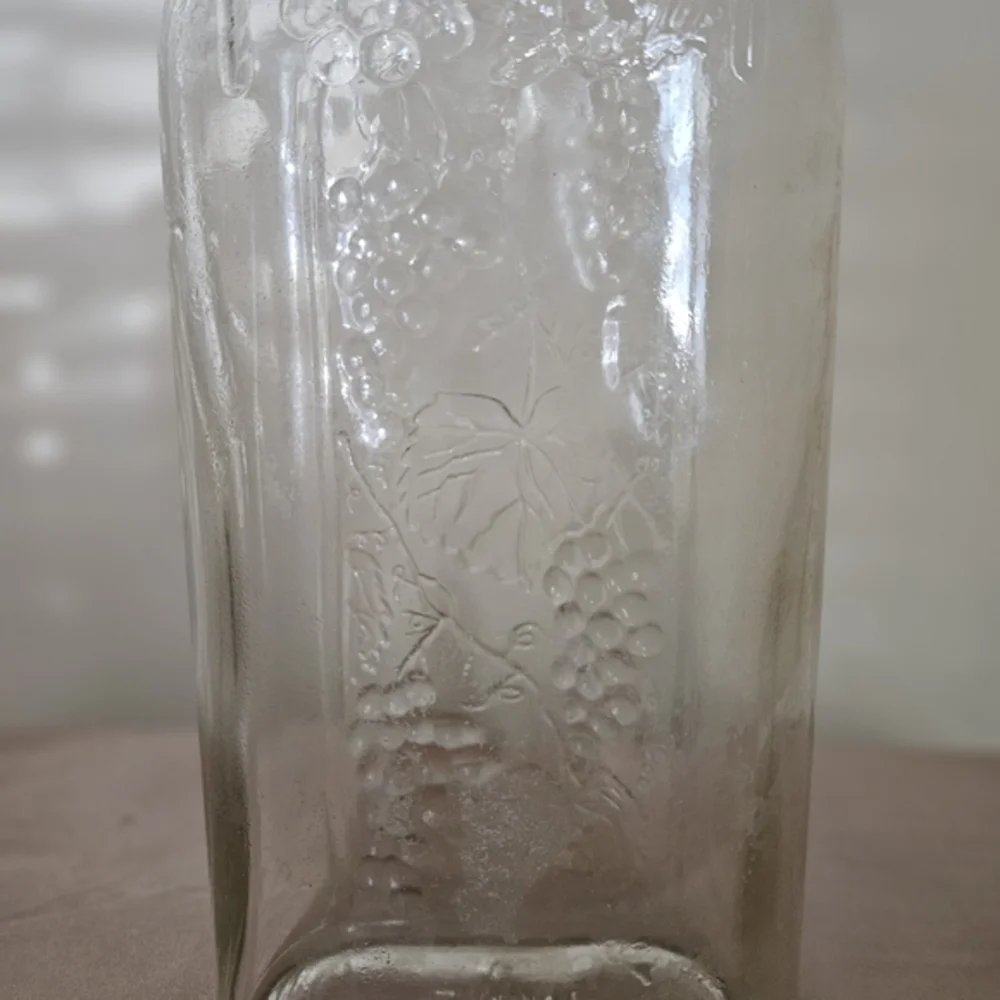 Old Mr. Boston Liquors Glass Bottle with Embossed Grape‎ Vine Design